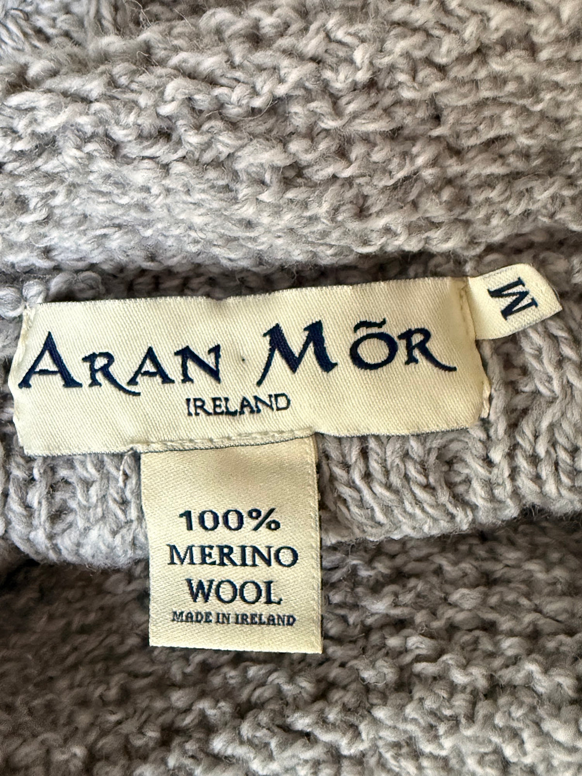 Aran Mor grey merino cable-knit sweater label