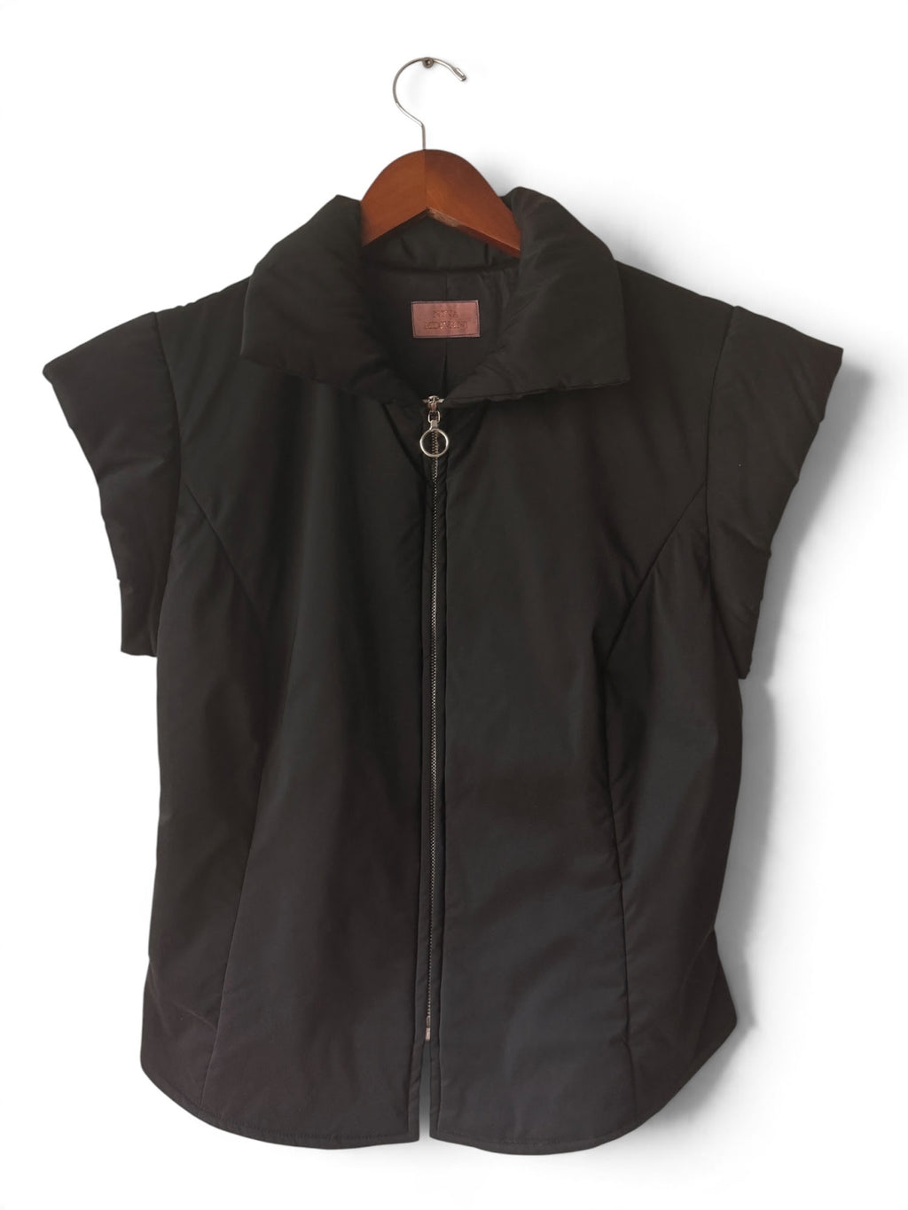 Nina Midvani black zip-front padded vest front