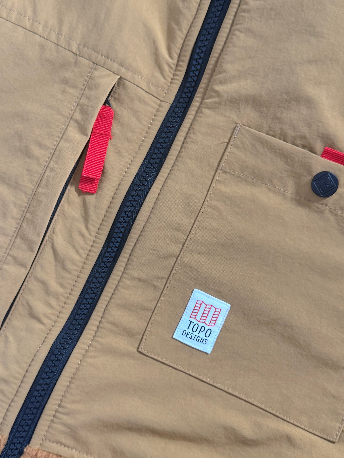 Topo Designs chest pocket and logo detail