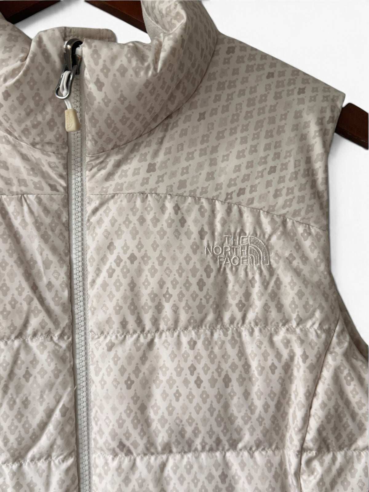 The North Face cream down puffer vest photo