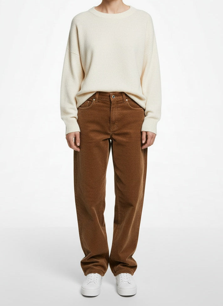 Full body view of the model wearing Dries Van Noten Tan Corduroy Trousers Size 29