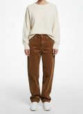 Full body view of the model wearing Dries Van Noten Tan Corduroy Trousers Size 29