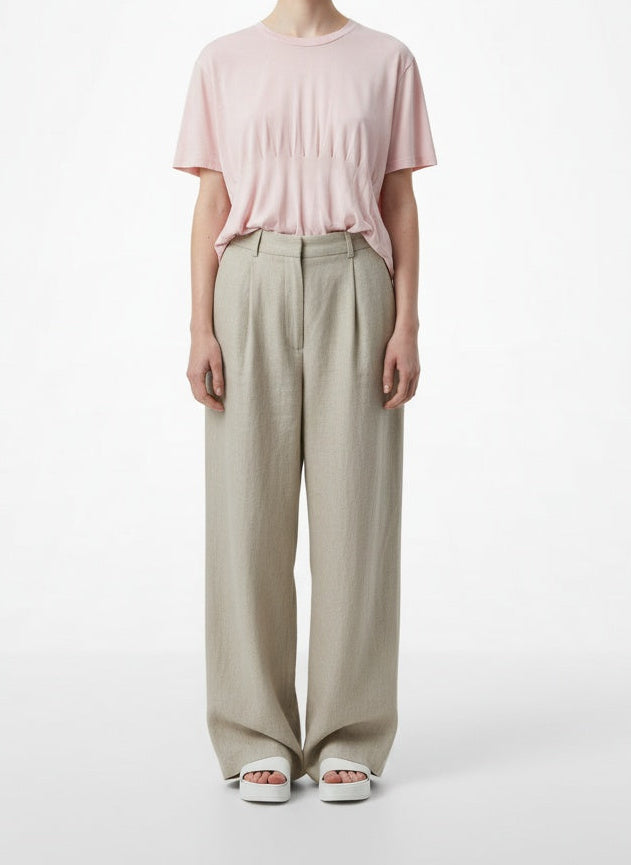 Full body view of the model wearing Haider Ackermann Pale Pink T-Shirt Medium