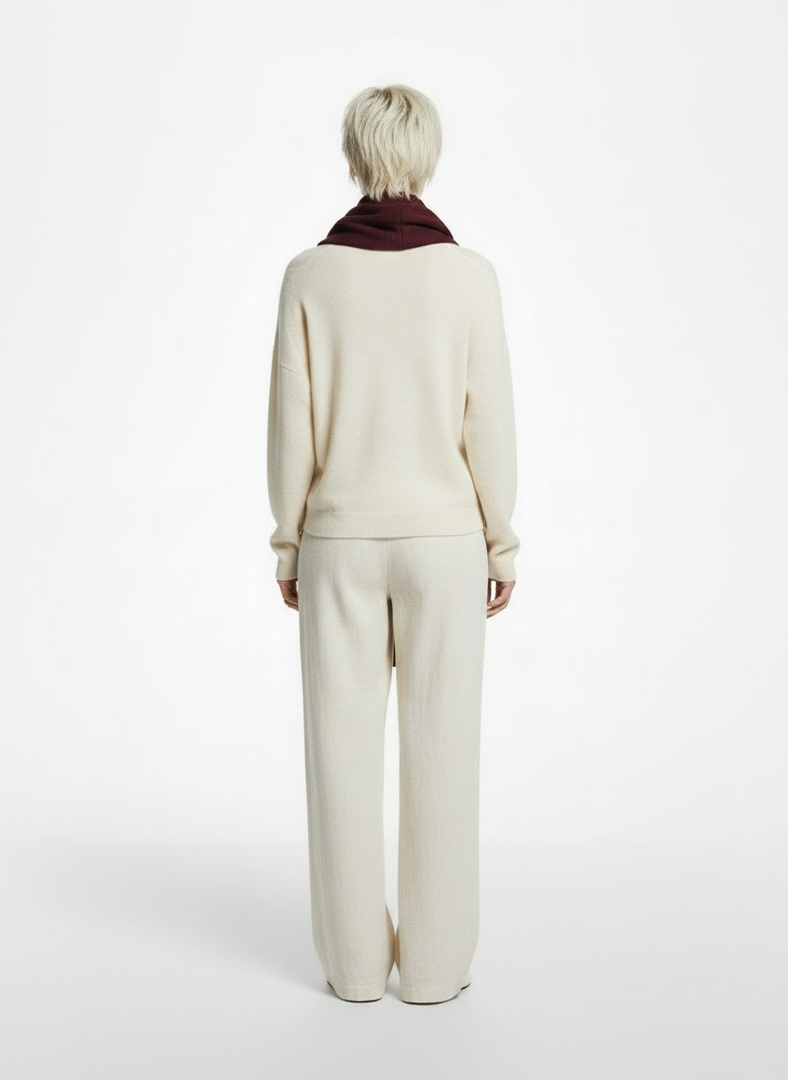 Back pose of the model wearing Aritzia Burgundy Cashmere Scarf