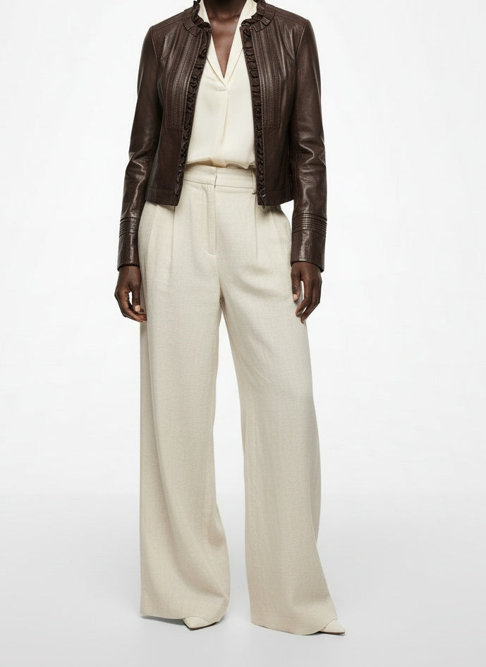 Full body view of the model wearing Elie Tahari Brown Leather Jacket Medium